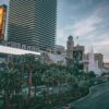 Vibrant view of Las Vegas's iconic skyline and busy boulevard with modern buildings and neon lights.