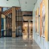 Spacious and modern hotel lobby in Dubai with elegant decor and marble floors.