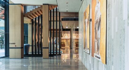 Spacious and modern hotel lobby in Dubai with elegant decor and marble floors.