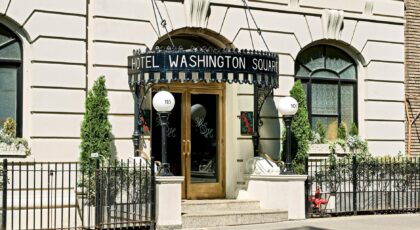 Elegant entrance of Hotel Washington Square, capturing classic New York architectural charm.