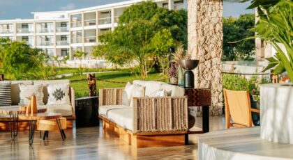 Elegant outdoor seating area with tropical decor in Zanzibar resort.