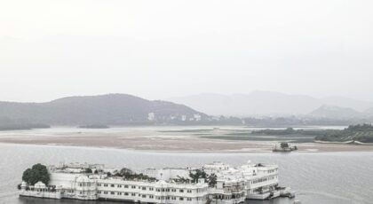 A serene view of the famous Lake Palace on Lake Pichola in Udaipur, India.